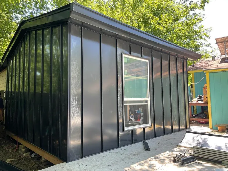 Black standing seam metal wall panels for Metal Roof Installation in Wausau