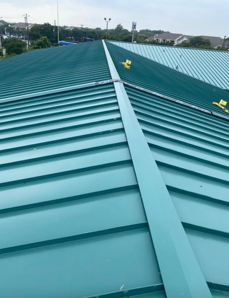 Green commercial metal roof ridge and valley for Metal Roof Repair in Wausau