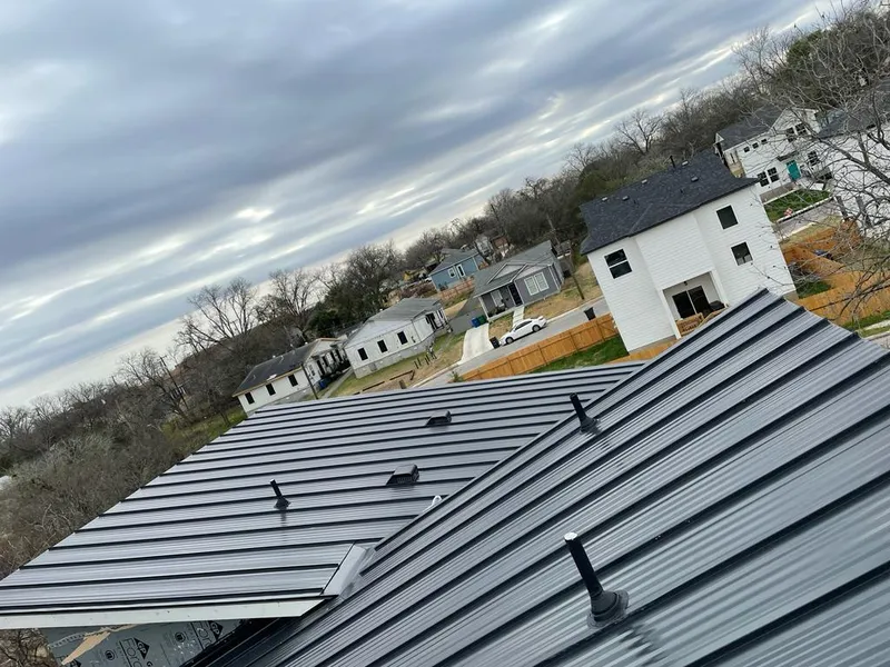 Standing seam metal roof panels with vents for Skylight Repair in Wausau